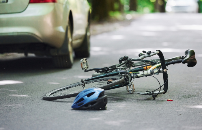 Bike on the floor expressing the concept of a bicycle accident