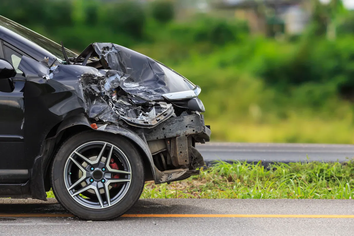 Image of a sedan damaged in a car accident