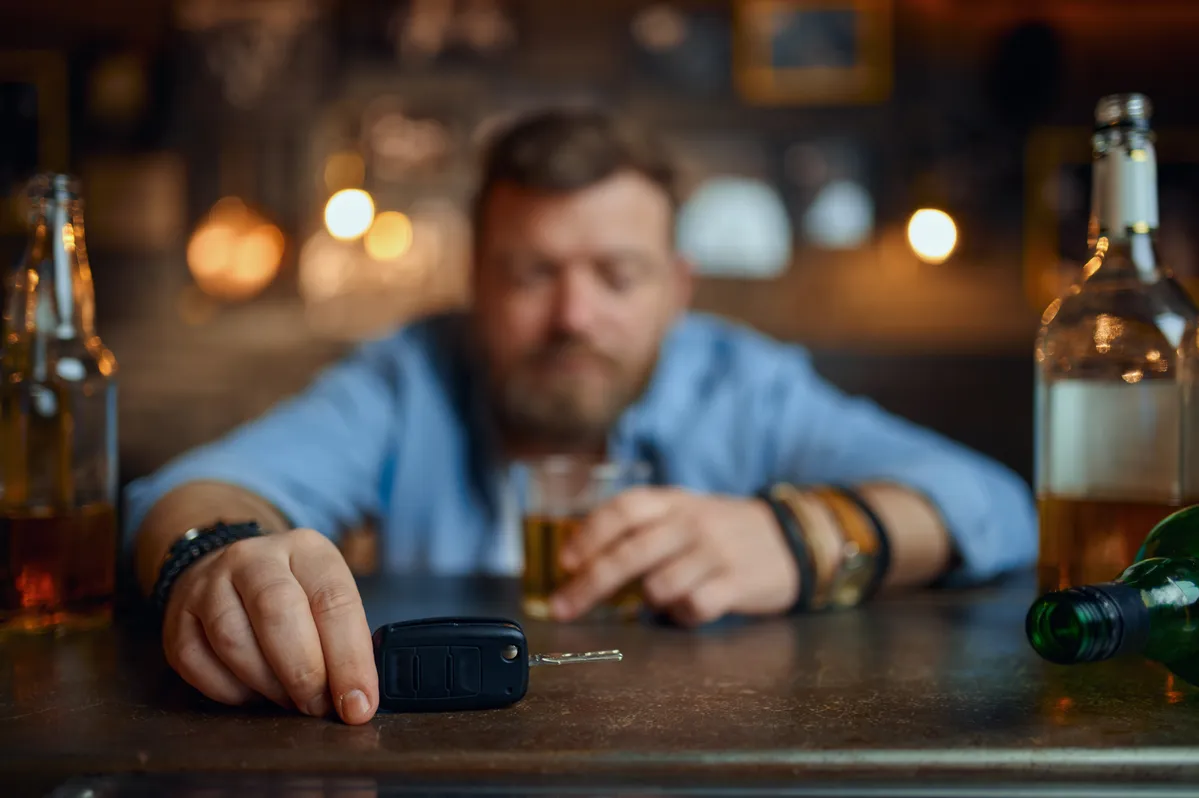 drunk man with car keys