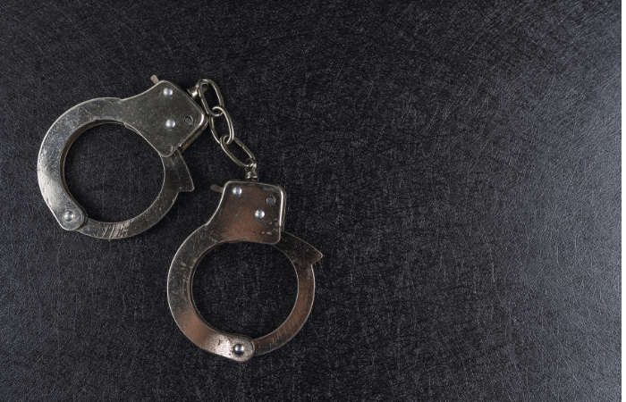 Image of handcuffs to represent a felony