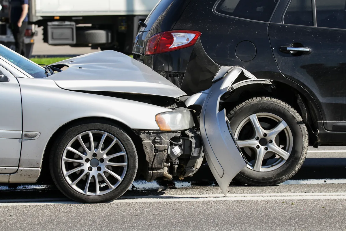 Image of rear-end accident with two vehicles