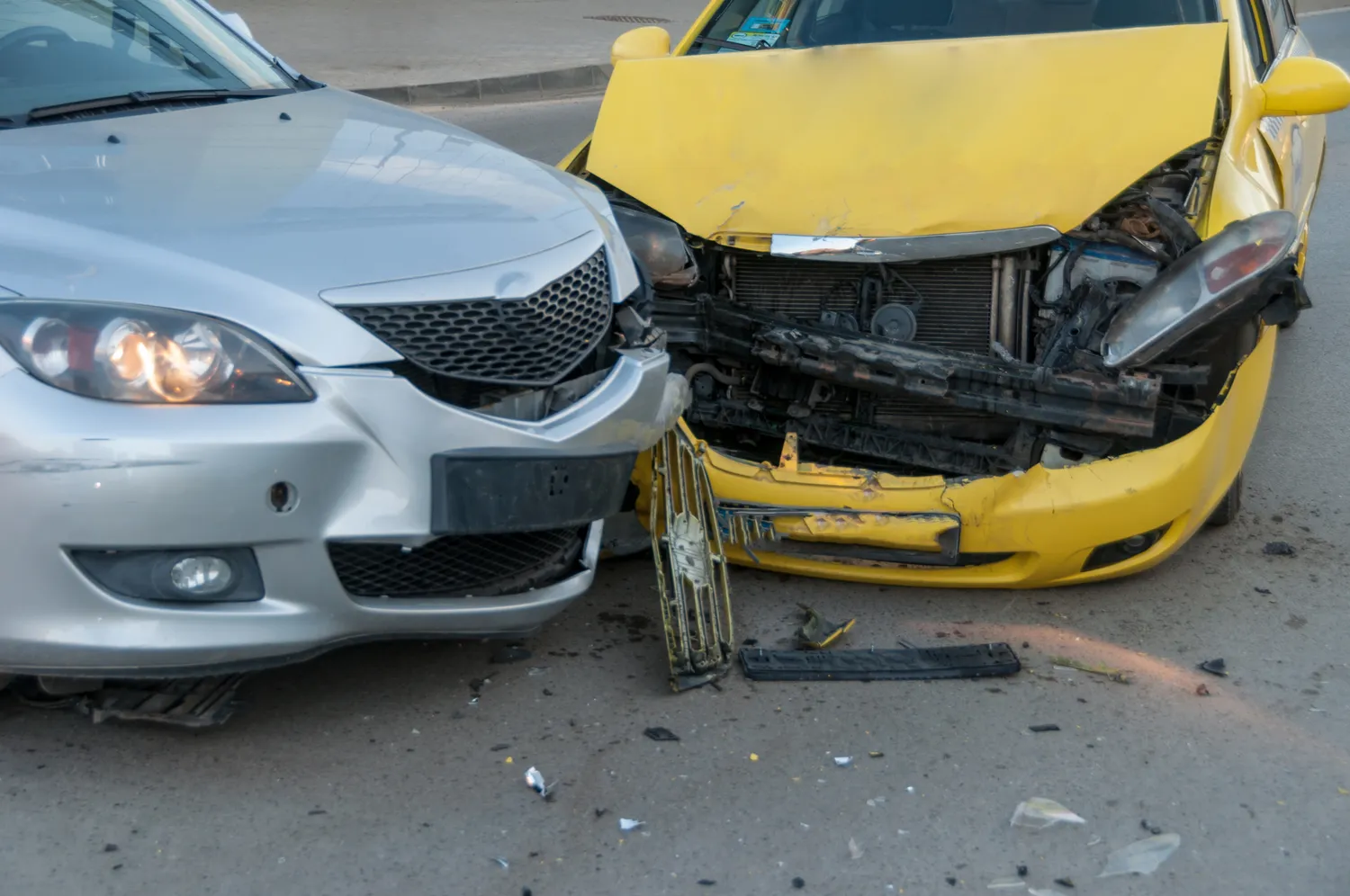 Image of two sedans in a head-on car accident
