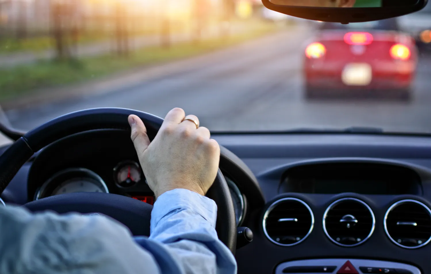 Image of a man driving on the road