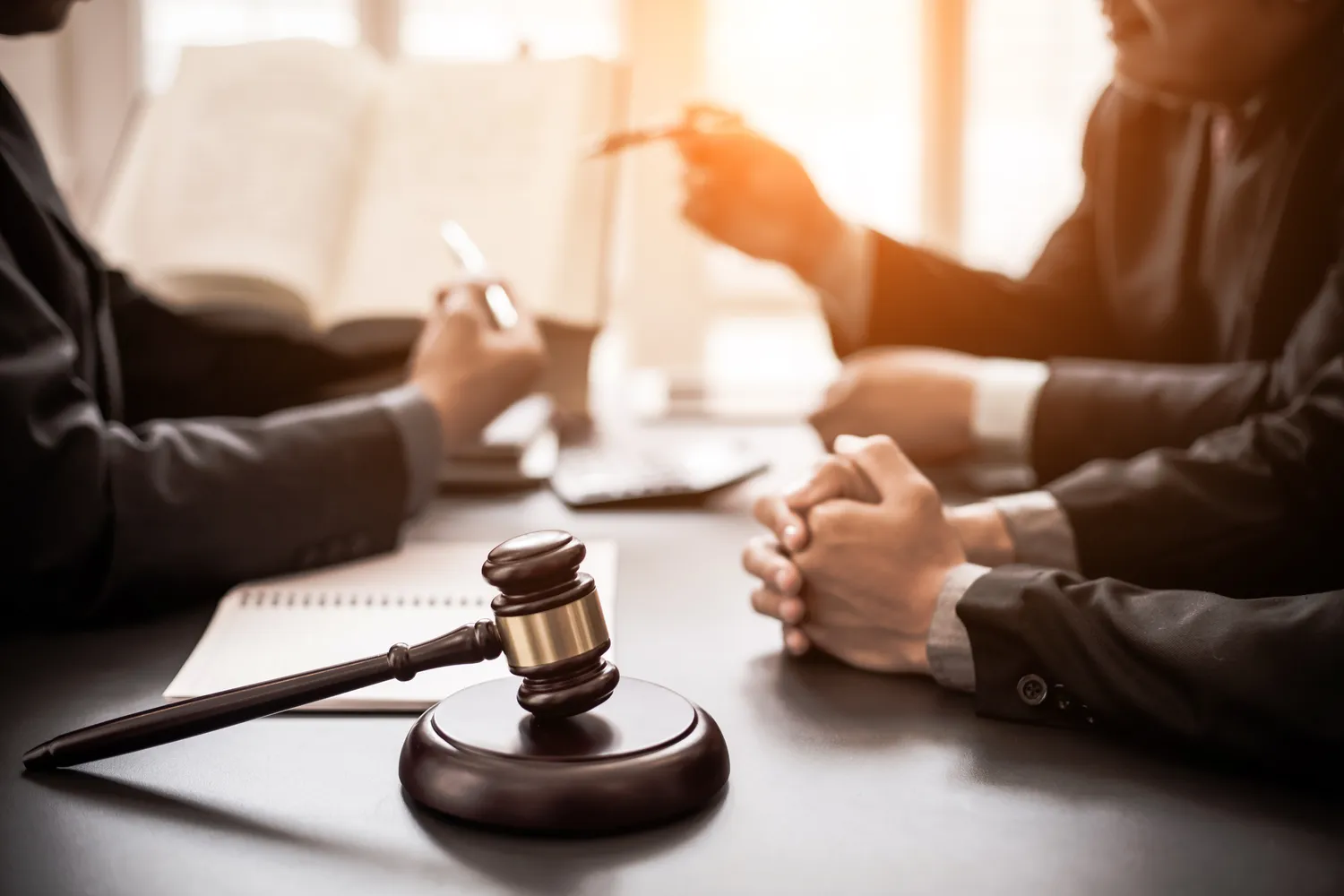 Image of Businessmen talking with a judge.