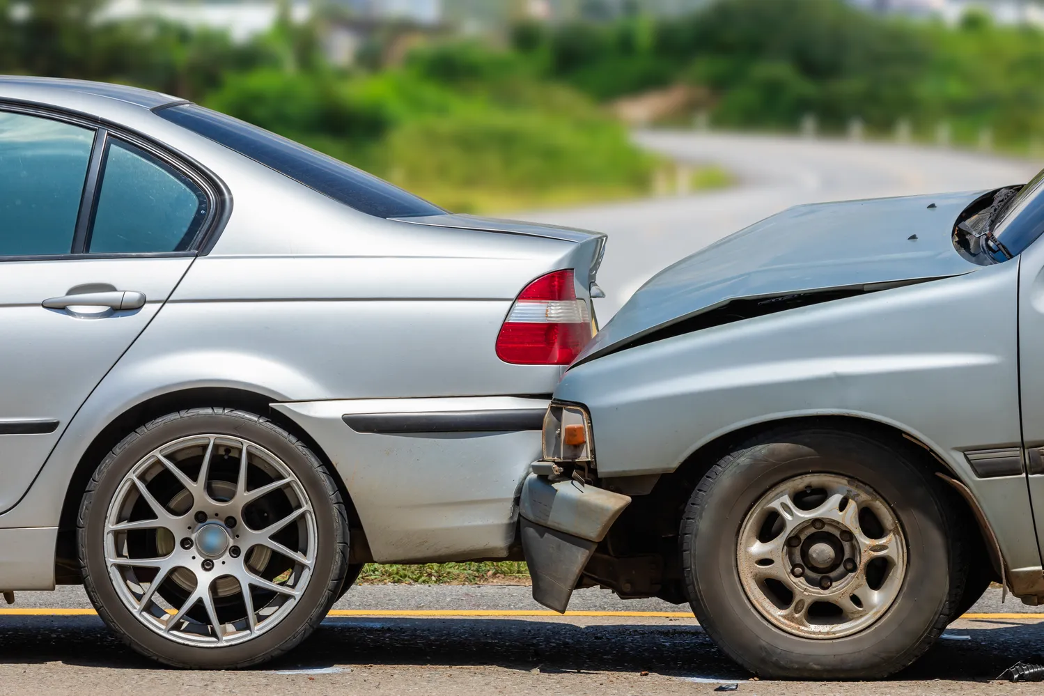 Image of two sedans in a rear-end car crash